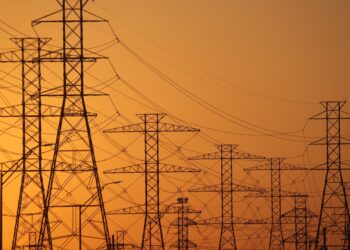 HOUSTON, TEXAS - FEBRUARY 21: A view of high voltage transmission towers on February 21, 2021 in Houston, Texas. Millions of Texans lost their power when winter storm Uri hit the state and knocked out coal, natural gas and nuclear plants that were unprepared for the freezing temperatures brought on by the storm. Wind turbines that provide an estimated 24 percent of energy to the state became inoperable when they froze. (Photo by Justin Sullivan/Getty Images)