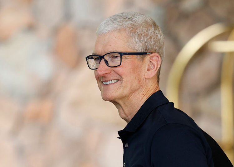 SUN VALLEY, IDAHO - JULY 08: Apple CEO Tim Cook arrives at the Sun Valley lodge for the Allen & Company Sun Valley Conference on July 8, 2025 in Sun Valley, Idaho. Every year, some of the world's wealthiest and most powerful figures from the media, finance, technology, and political spheres converge at the Sun Valley Resort for the exclusive week-long conference hosted by boutique investment bank Allen & Co. (Photo by Kevin Dietsch/Getty Images)