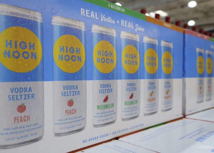 SAN DIEGO, CALIFORNIA - APRIL 4: Cases of   High Noon vodka seltzer are stacked at a Costco are stacked at a Costco Wholesale store on April 4, 2025 in San Diego, California. (Photo by Kevin Carter/Getty Images)