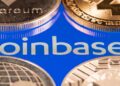 Coinbase crypto exchange logo on screen with altcoins. Ljubljana, Slovenia - April 12 2021