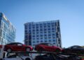 New Tesla vehicles are loaded on a car carrier in New York City, U.S., April 26, 2024. REUTERS/Mike Segar/File Photo