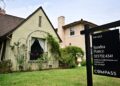 A 'For Sale' sign is posted beside property for sale in Alhambra, California, on August 28, 2025. Home sales across the country have slowed as interest rates remain a critical barrier to buyers with less than 30% of US homes now affordable for the typical US household, according to a Realtor.com report. (Photo by Frederic J. BROWN / AFP) (Photo by FREDERIC J. BROWN/AFP via Getty Images)